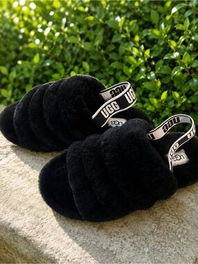 UGG Black Shearling Slide Boots with Logo Strap
